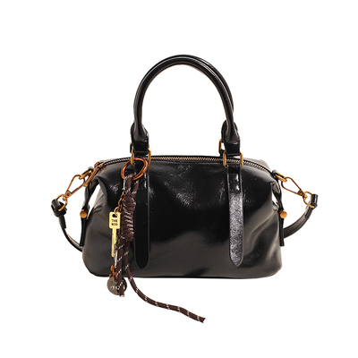 复古油蜡皮手拎包女2025新款时尚百搭高级感斜挎包休闲单肩枕头包