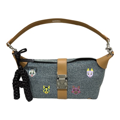 玛莎轻奢撞色牛仔腋下包女2026年卡通印花休闲锁扣单肩斜挎包百搭