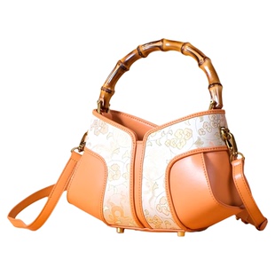 曼莎国风宋锦香云纱手提斜挎刺绣真丝牛皮新款新中式女包旗袍包包