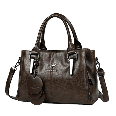 袋鼠正品真皮女包牛皮手提包