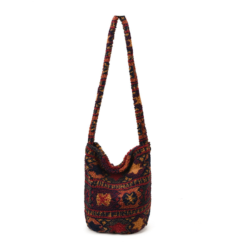 秋冬羊羔毛单肩包女2025新款毛绒休闲斜挎包韩国大容量毛呢水桶包