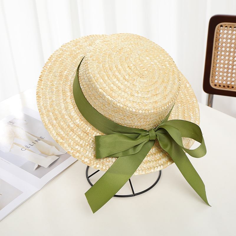 麦秆编织平顶果绿色蝴蝶结飘带龄宽沙滩韩版夏减檐遮阳草帽女度假