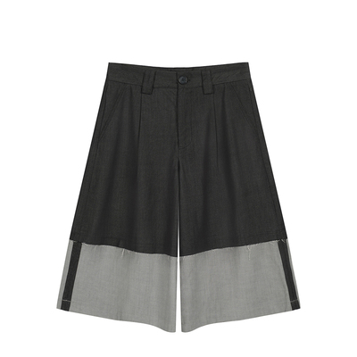 仿牛仔拼接宽松毛边阔腿七分裤