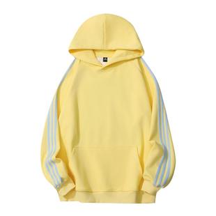 嫩黄色三条杠连帽卫衣女秋冬潮牌设计感宽松大码加绒加厚套头上衣