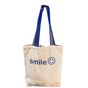 小白兔几日系毛球肩带刺绣笑脸大容量帆布包学生上课单肩包购物袋