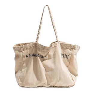 橙子少女卡其色复古做旧风帆布包逛街旅行大号托特包单肩小众设计