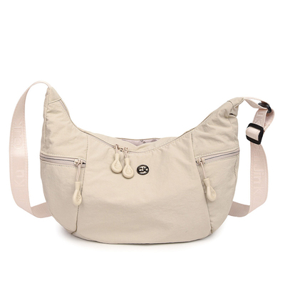 日系超轻时尚帆布包男女斜挎包多口袋休闲单肩包新款大容量牛角包