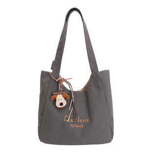 大容量休闲帆布包包女2026新款时尚简约单肩包日常上班通勤托特包