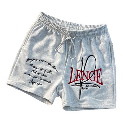不过膝刺绣字母宽松运动裤短裤