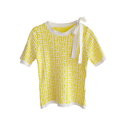 回字纹提花斜肩蝴蝶结短袖针织衫