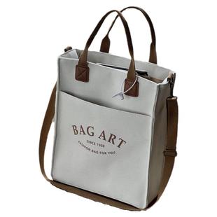 大容量帆布包加厚文艺拉链单肩斜挎包学生上课通勤简约印花手提袋