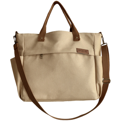 喜凡你文艺通勤手提斜挎帆布包