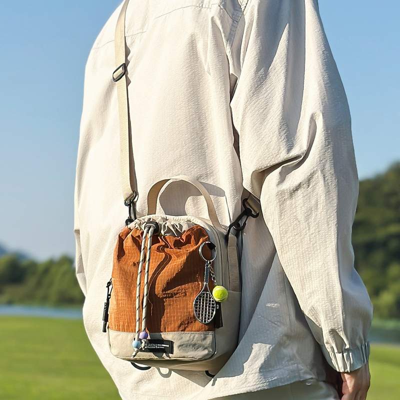 两用斜挎水杯包户外运动双肩包小众休闲单肩包轻便徒步登山水壶包