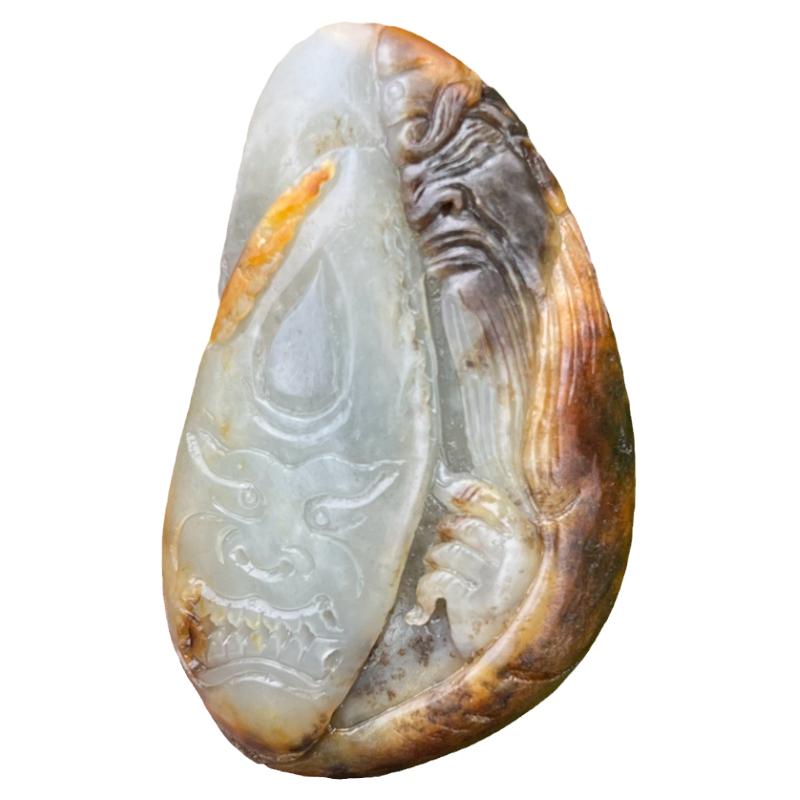 新疆和田玉虎皮籽料关公吊坠