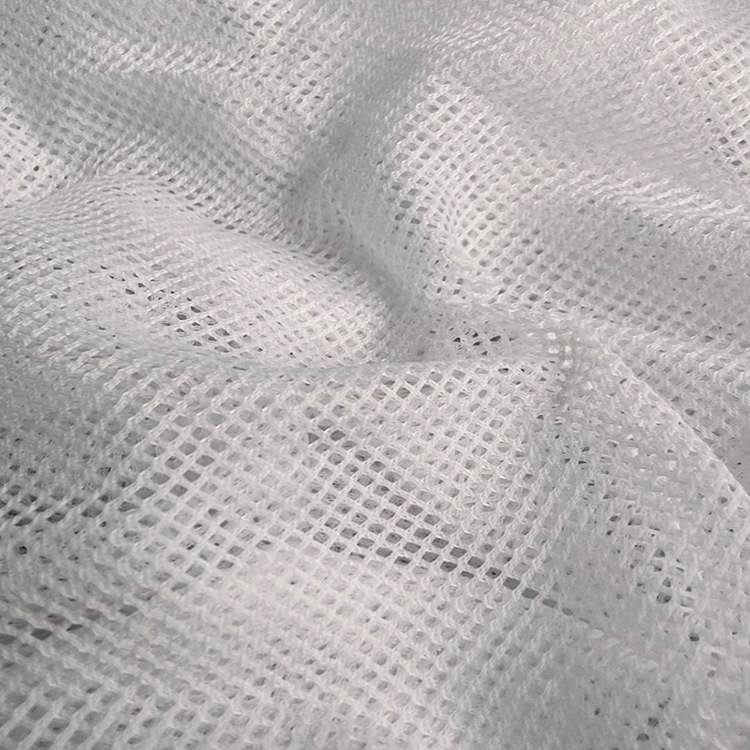 现货75D四角网布65克面料辅料网眼经编里布校服网布2x2菱形内衬