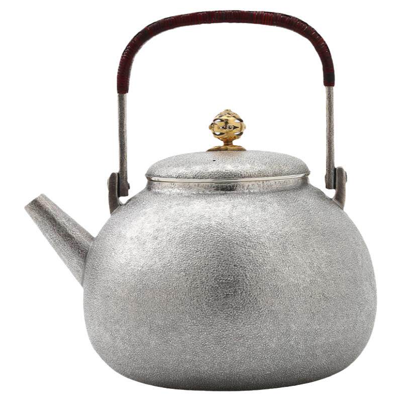 一张打精工锤纹茶具釉面乾坤银壶