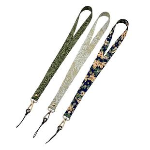 手机挂绳斜挎可调节手腕绳手机壳结实挂件挂脖ins风图案包包挂带