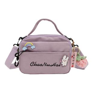 帆布小包包女2025新款潮简约百搭学生手机包日系小清新可爱斜挎包