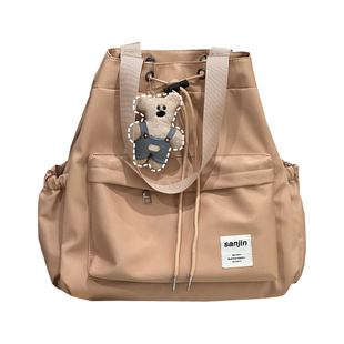 日系小众设计感手提书包大学生上课通勤休闲双肩包女旅行登山背包