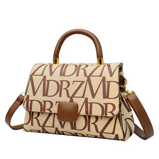 妈咪妈妈母婴背包2024新款手提双肩大容量外出轻便斜挎多功能帆布