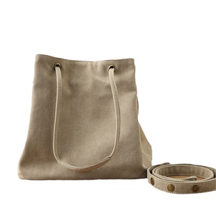 庸庸原创文艺复古小包包女帆布手提单肩包简约布包通勤水桶斜挎包