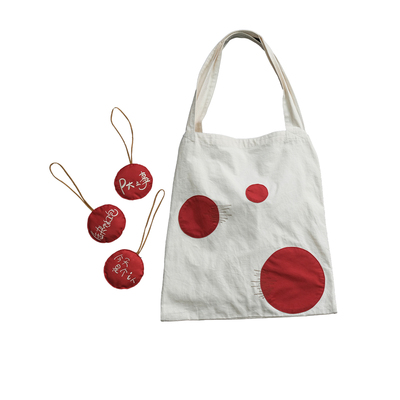 远家年服撞色波点帆布包LL5983