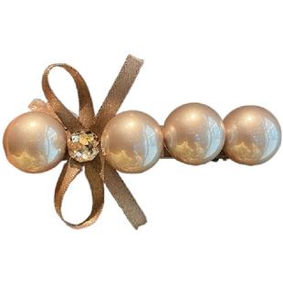 高级感贝珠蝴蝶结发夹女时尚优雅后脑勺半抓精致弹夹新款气质发卡