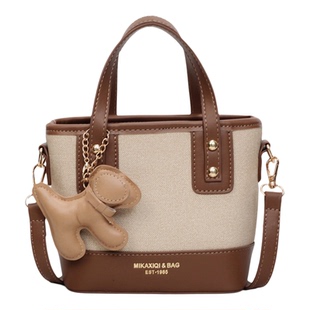 小众手拎包包女式2026新款潮春季高级感通勤斜挎水桶包百搭单肩包