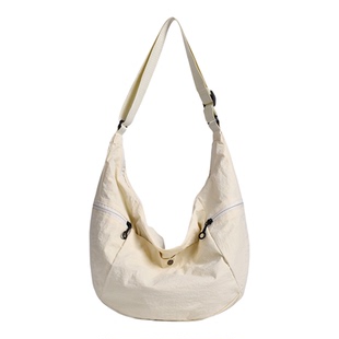 时尚通勤大容量单肩斜挎包2026女新款夏季百搭托特包腋下包牛角