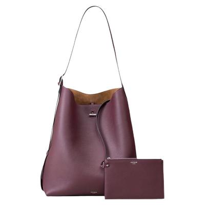 堤喀进口牛皮水桶包轻奢通勤包