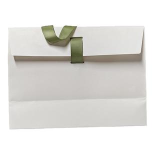 白色牛皮纸手提包装袋轻奢创意口袋定制logo高级感伴手礼品袋工厂