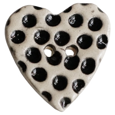 黑色凹陷波点手工陶瓷纽扣