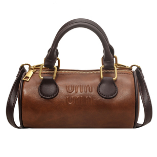 Mankok超火小圆筒包包女2025新款轻奢小众设计师高级感单肩斜跨包