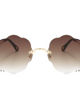 个性云朵无框粉色渐变街拍墨镜女