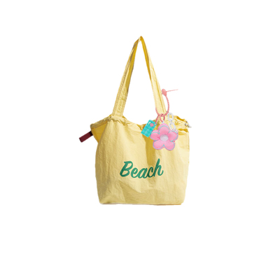 橙子少女韩版抽绳字母印花单肩包