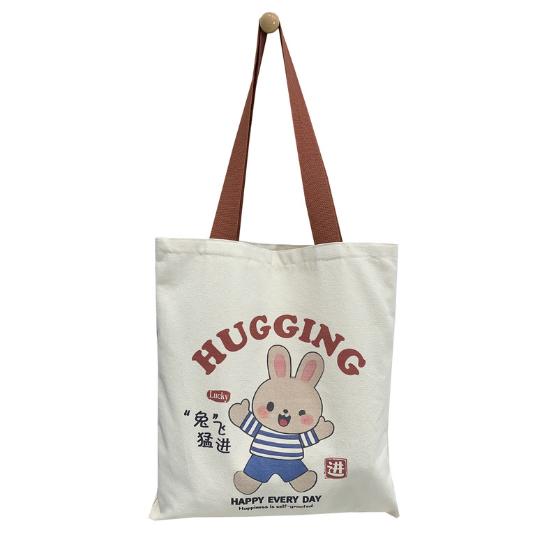 帆布包女2025新款可爱手提袋子文艺学生通勤手提包上课小众手拎袋