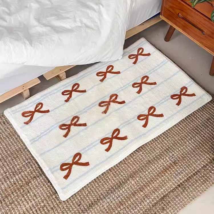 蝴蝶结少女感仿羊绒地垫易入户浴室垫玄关吸水门打理脚垫批发