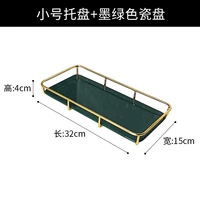 Маленькая темно -зеленая керамическая модель