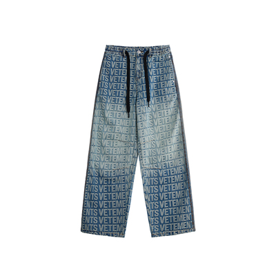 VETEMENTS秋冬满印牛仔长裤