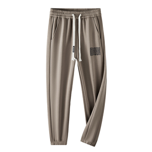 男士休闲裤冬季加绒加厚2025新款运动卫裤青少年宽松束脚裤子男款