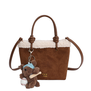 秋冬超火手提羊羔毛绒水桶包包女2025新款轻奢小众高级感斜挎小包