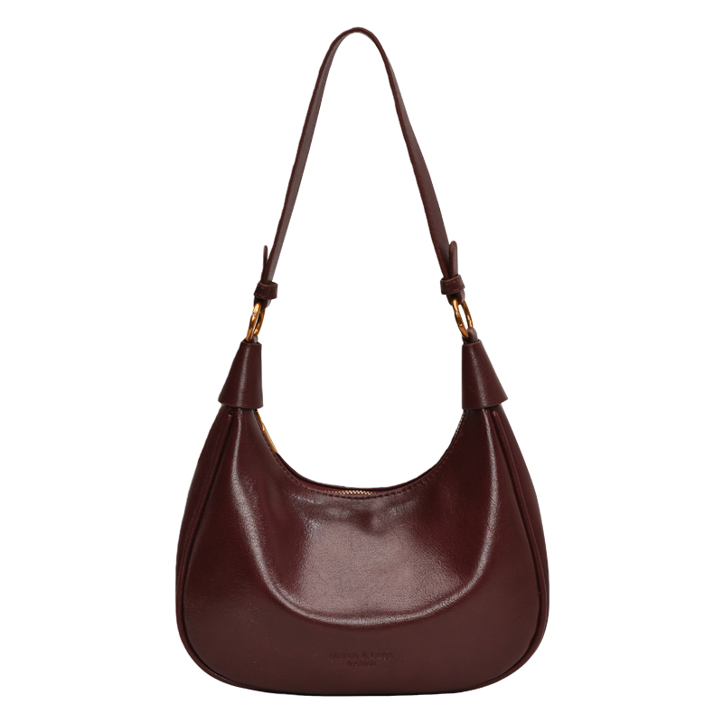 红色超火腋下包包女式2025新款秋冬轻奢小众高级感通勤斜挎饺子包