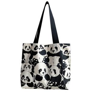 原创设计熊猫大容量单肩帆布包包女学生通勤手提书包袋2022年新款