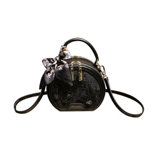 香港品牌包包女款2025新款冬季高级感斜挎小包真皮手提单肩小圆包