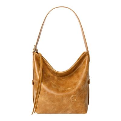 CASSILE卡思乐水桶包女2025新款复古植鞣牛皮高级感单肩包筒包