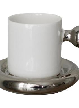 轻奢样板间客厅茶几咖啡杯