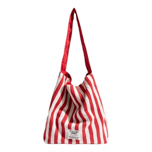 橙子少女条纹托特包女2026新款学生休闲简约大容量百搭红色帆布包