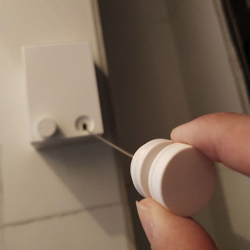 隐形伸缩免打孔酒店晾衣绳钢丝厂家直销可收缩晾衣架阳台壁挂室内