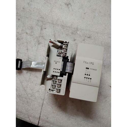 在线议价三菱PLC模块  FX2N－1PG－E实物图片，成色如图，功