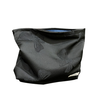 小白兔几时尚高贵纯黑化妆包暗纹蝴蝶结优雅随身收纳袋拉链女小包